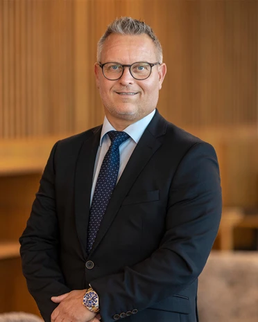 Portrætbillede af Henrik Hasselflug Nielsen