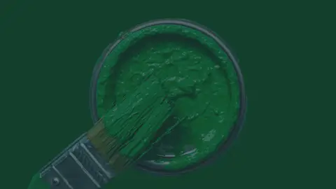 Image of green paint with text above it